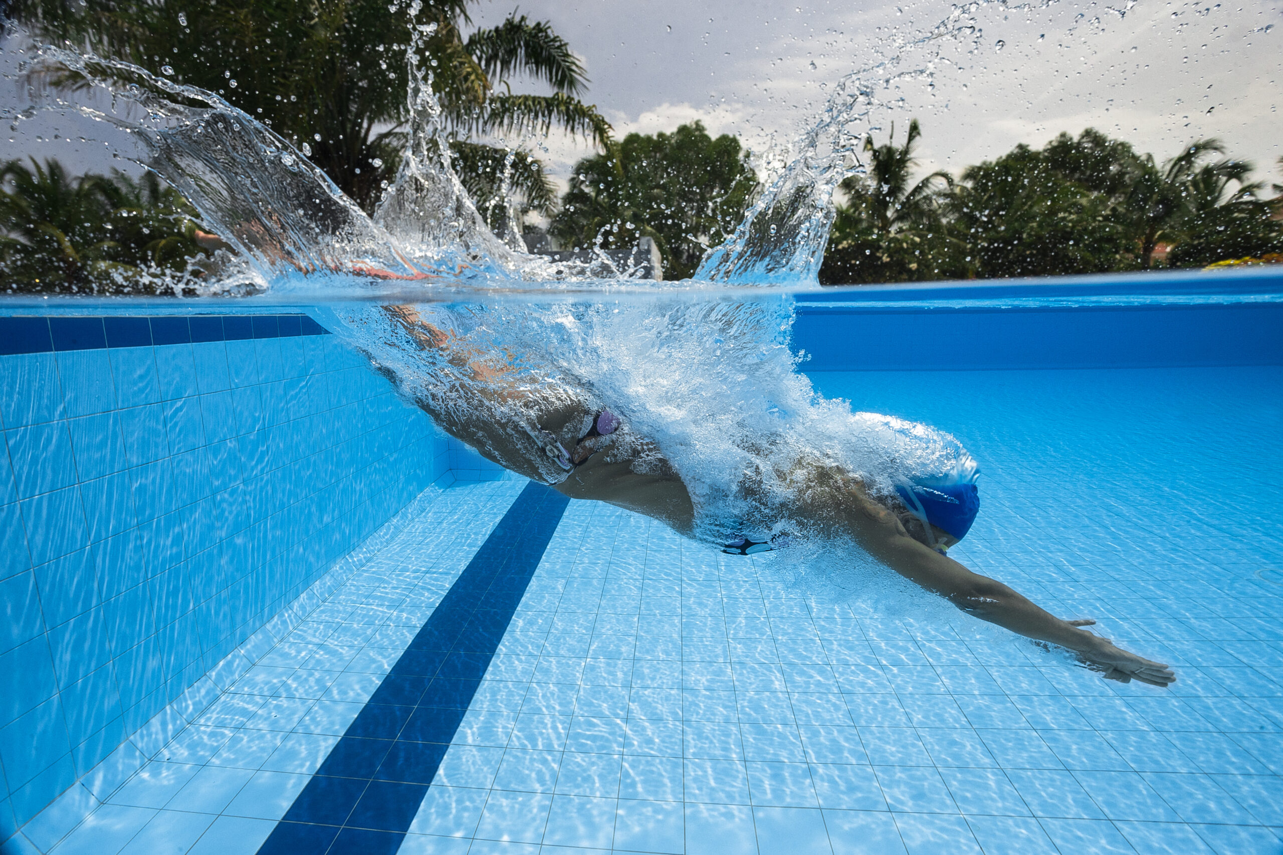 Woman diving into a swimming pool