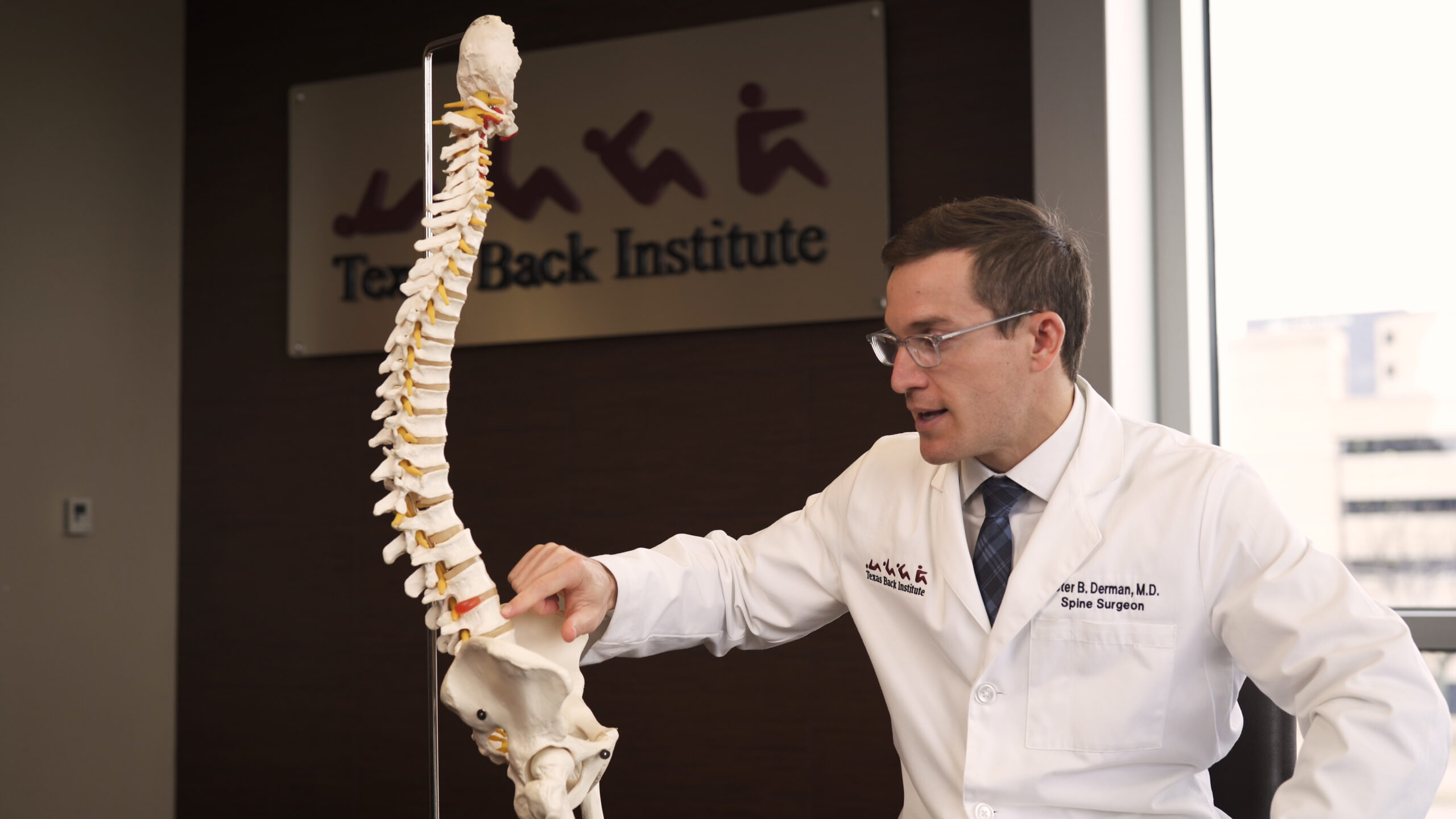 Dr Derman demonstrating nerve compression