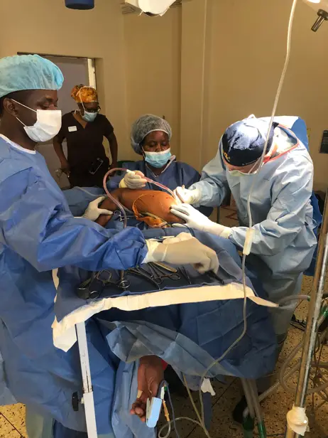 Dr-Schaffer-working-on-biopsy-Uganda-Spine-Surgery-Mission-2019-Day6